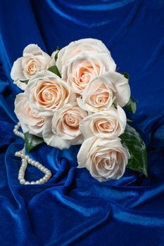 Bouquet of flowers on a fabric background