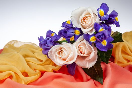 Bouquet of flowers on a fabric background