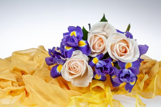 Bouquet of flowers on a fabric background