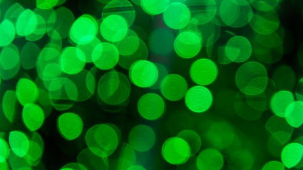 Abstract  green color  with bokeh defocused lights background