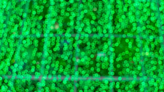 Abstract  green color  with bokeh defocused lights background