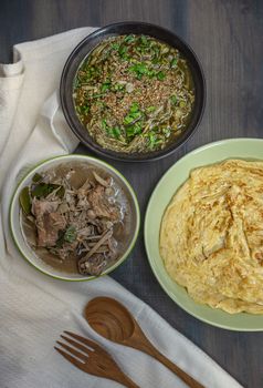 Top view of Thai style food  over wooden table