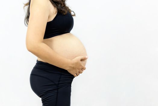 Close up  of pregnant  asian woman in black underwear