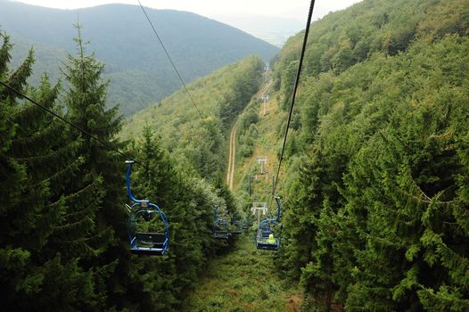 Cableway in the forest on a very high hill