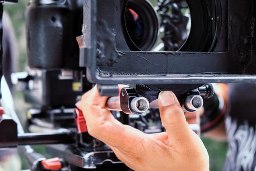 Behind the scene. cameraman shooting film scene with camera
