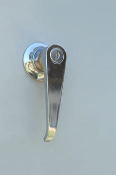 new silver handle lock for the door.