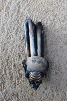 burn Compact Fluorescent Lamp on the floor