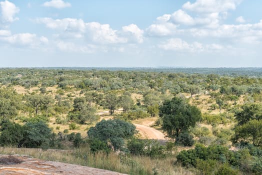 View from the Mathekenyane Viewpoint on top of a hill.  The gravel approach road is visible