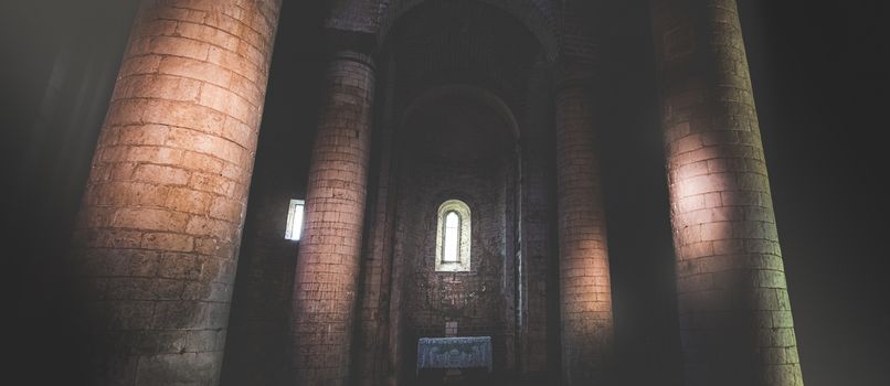 dark church interior columns sun rays light horizontal panoramic .