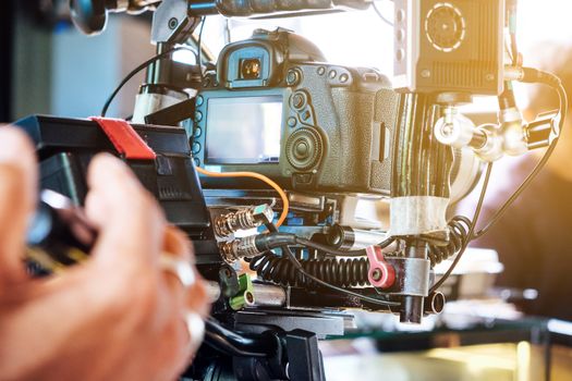 Film industry. Filming with professional camera background