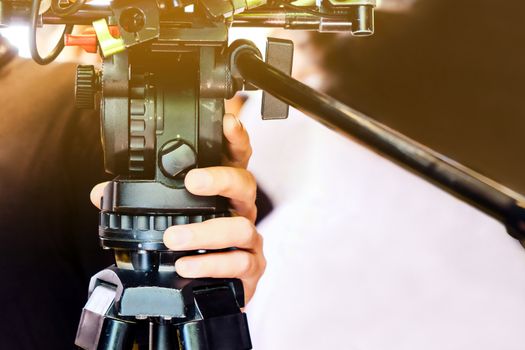 Behind the scene. cameraman shooting film scene with camera