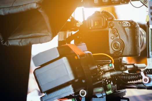 Film industry. Filming with professional camera background