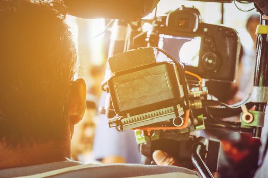 Film industry. Filming with professional camera background