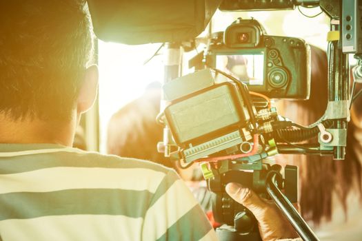Film industry. Filming with professional camera background