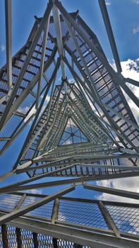 View from below through the metal grill on the tower