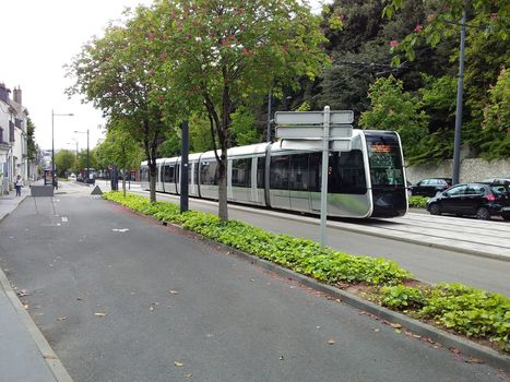 mini guide to France tram and tram tracks in a picturesque location