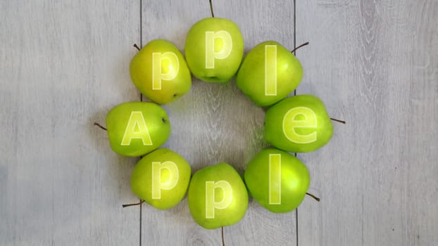 apples medium-sized green juicy lie on the wooden surface there is room for text