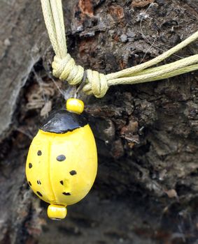 an Beautiful hand made polymer clay yellow pendant