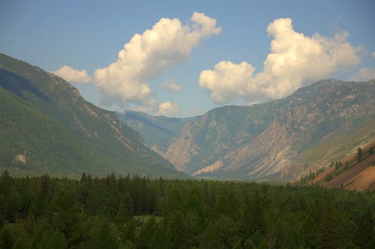 Picturesque fertile valley surrounded by high mountains. Altai, Siberia, Russia