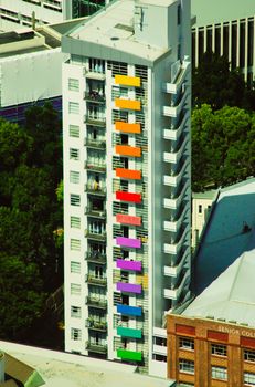 A building with rainbow colored balconies