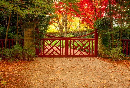 Red gate and autumn colours of beautiful gardens of Mount Wilson