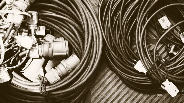 Filming Equipment, Pile of power plugs Background