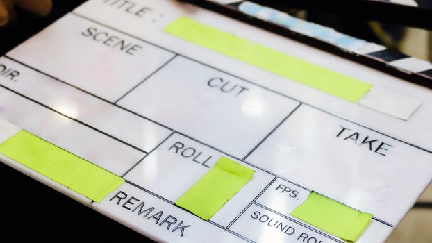 Film production crew, close up of movie Clapper board