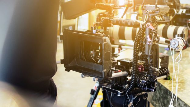 Film industry. Filming with professional camera background