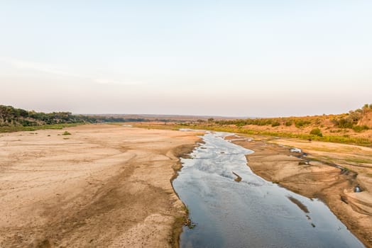 View of the Letaba River at sunset as seen from the road bridge on road H1-6