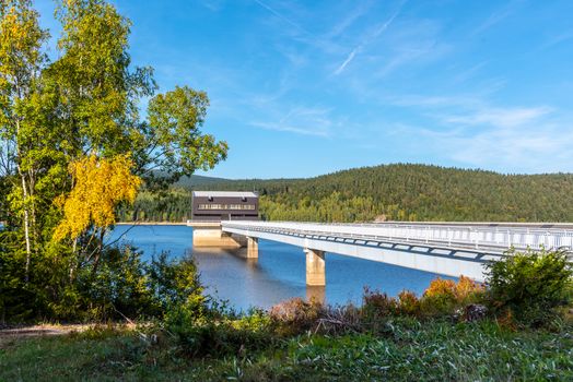 Mountain water reservoir Josefuv Dul, aka Josefodolska Dam, Jizera Mountains, Czech Republic. Sunny summer day.