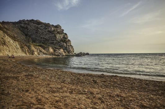 View of Cala Paradiso beach in Sicily during sunset