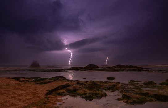 Lightning, heavy clouds and rain stormy weather