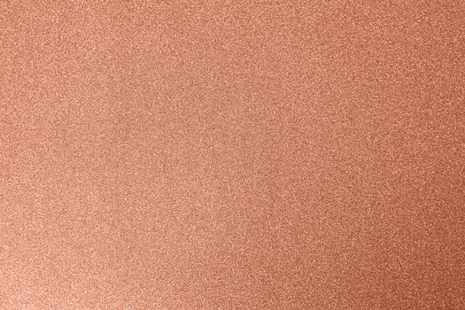 Copper festive background, close-up. Copy space for text. Horizontal. Celebration, holidays, sales, fashion concept, harvesting for mock up.
