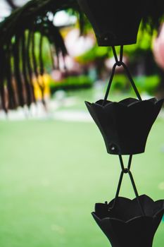 rain chain element architecture roof old temple garden japanese metal.rain chain japan design architecture closeup style vintage outdoor building asian. asia rain iron chain hanging, selected focus.