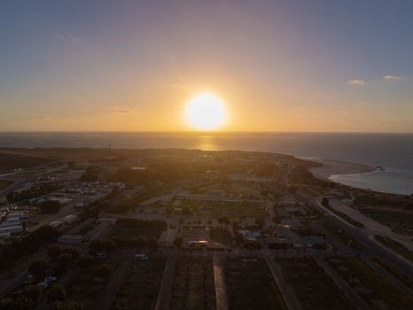 Aerial image of sunset over Coral Bay in Australia looking towards the Indian Ocean in Australia