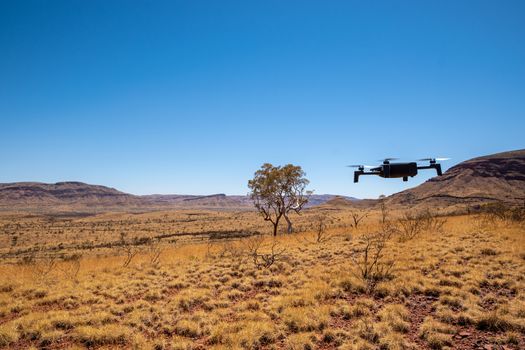 Drone hovering over landscape at Karijini National Park at Mount Bruce Australia