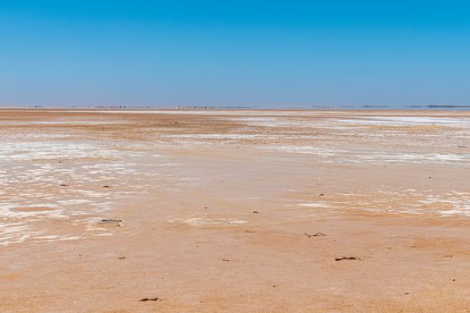 Lake Maclead arid salt lake in Western Australia mirage at the horizon