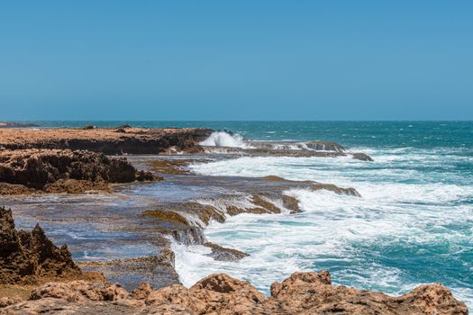 Quobba Blow Holes waves and spray during windy weather in Australia