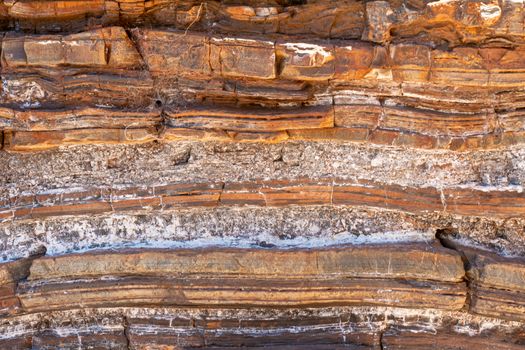 Sediment and rock layers at Karijini National Park in Dales Gorge including natural asbestos layers