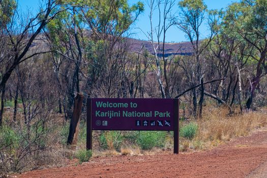 Welcome to Karijini National Park wood sign