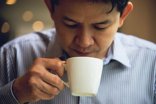 Business man eat the American breakfast set in a hotel - people take a breakfast in hotel concept