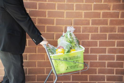 Man is shopping fresh vegetable in supermarket store - man in fresh market lifestyle concept