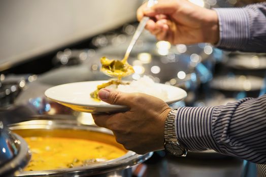 Business man eat the breakfast set in a hotel - people with breakfast in hotel concept