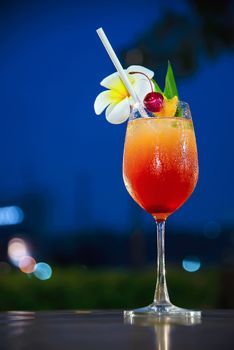 Cocktail recipe name mai tai or mai thai worldwide favour cocktail include rum lime juice orgeat syrup and orange liqueur - sweet alcohol drink with flower in twilight relax vacation concept