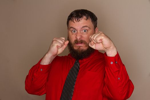 boss raising his hands to fight or a form of workplace violence