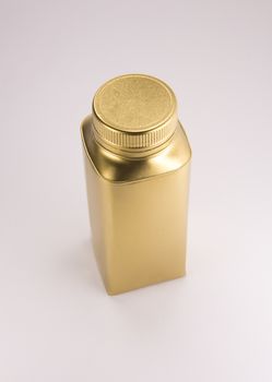 Gold plastic bottle. Clean pattern for packaging design