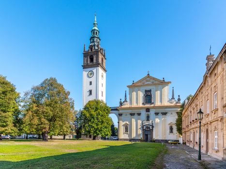 Baroque St. Stephen's Cathedral with bell tower at the Cathedral Square in Litomerice, Czech Republic.