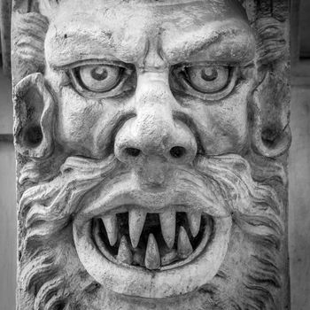 Italy, Turin. This city is famous to be a corner of two global magical triangles. This is a protective mask of stone on the top of a luxury palace entrance, dated around 1800