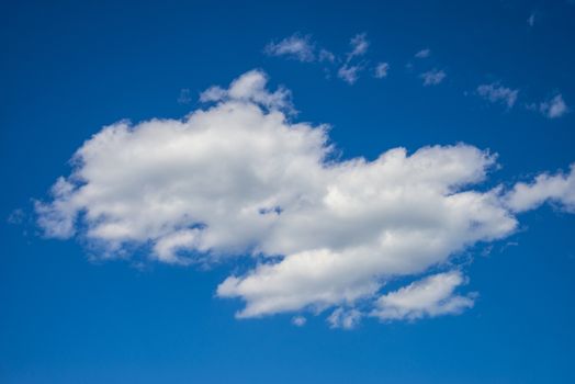 White clouds on the blue sky during the day. Nature landscape