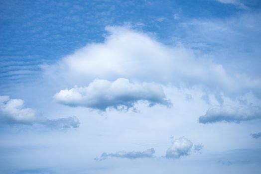 White clouds on the blue sky during the day. Nature landscape